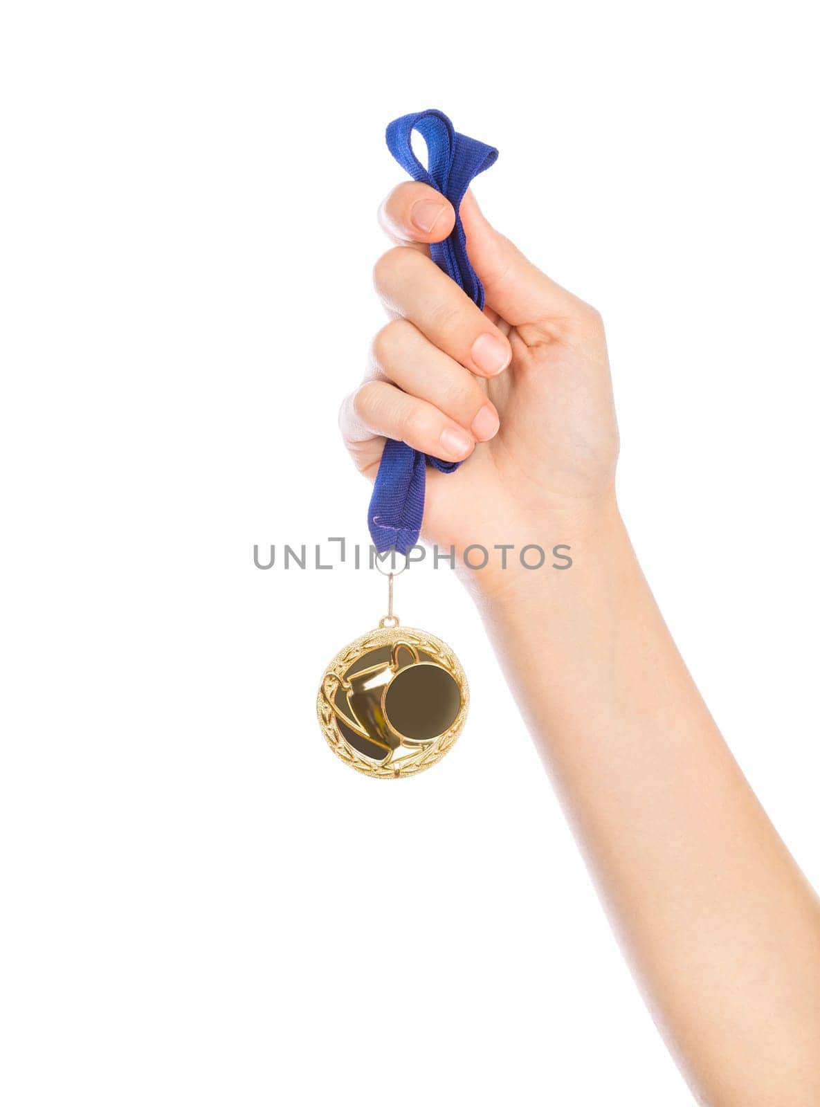 Girl hand raised holding gold medal against white background award and victory concept