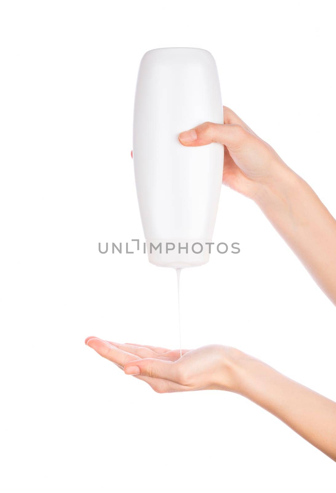 White bottle of shower gel lotion cream in hands pattern on a white background isolation