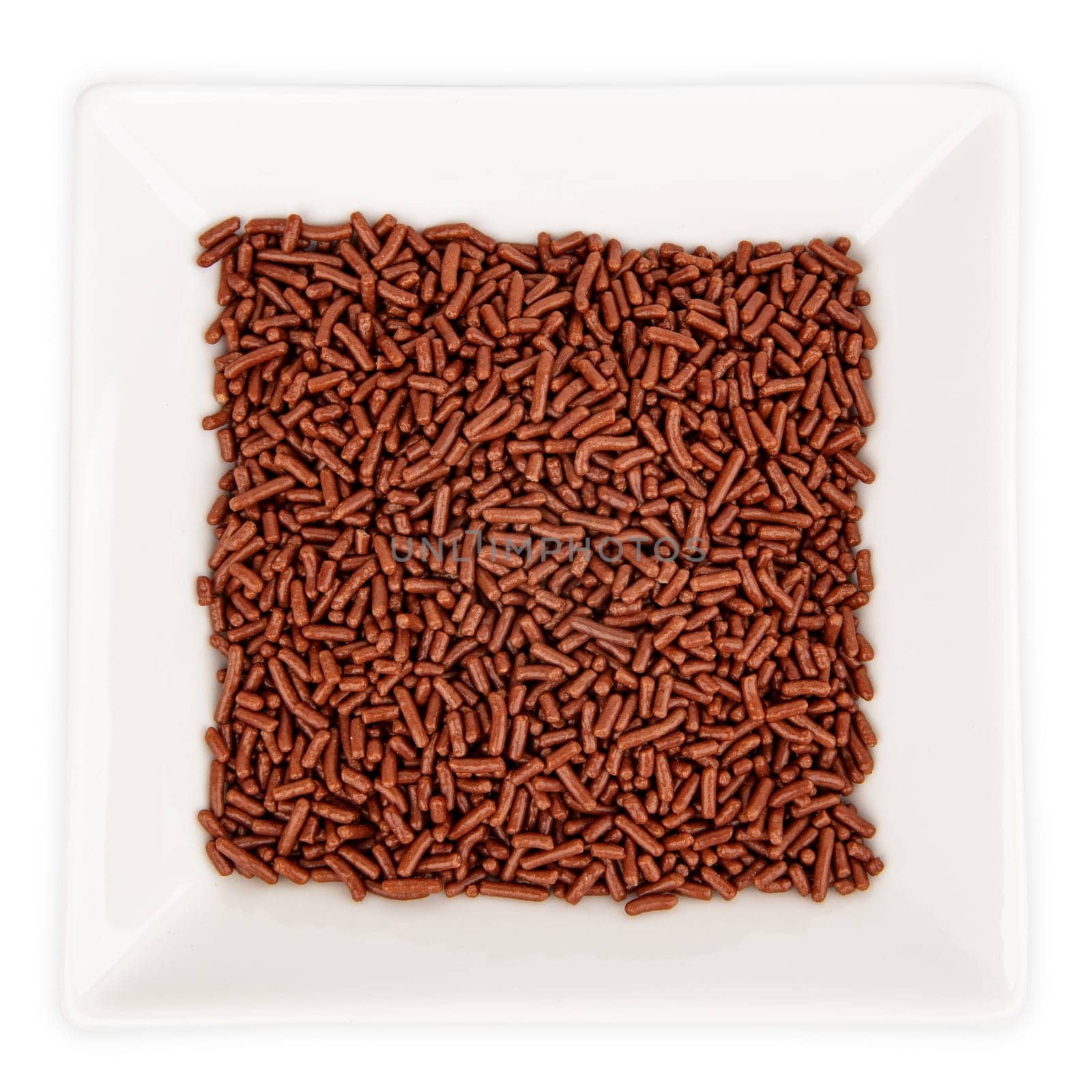 Chocolate Chips in bowl isolated on white background