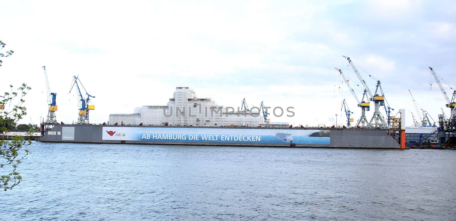 Octopus is a 414-foot (126 m) megayacht owned by the estate of the passed away  Microsoft co-founder Paul Allen is wrapped under plastic Wall for to get a secret general overhauled  in the Dock from Blohm and Voss - Port Hamburg on 05.05.2019