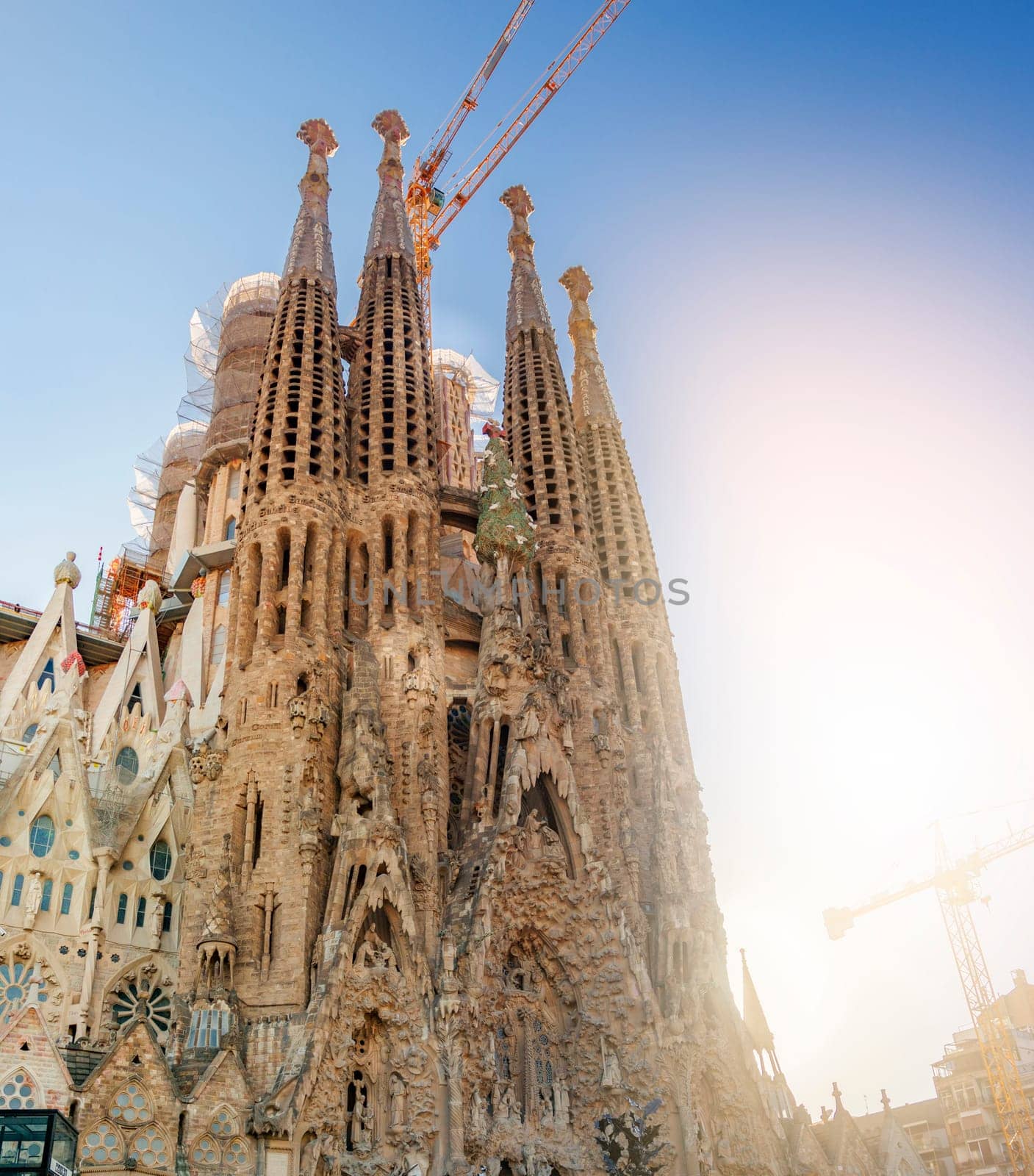 Barcelona, Spain, April 2019: The Nativity facade of the famous Sagrada Familia church in Barcelona designed by architect Antoni Gaudí