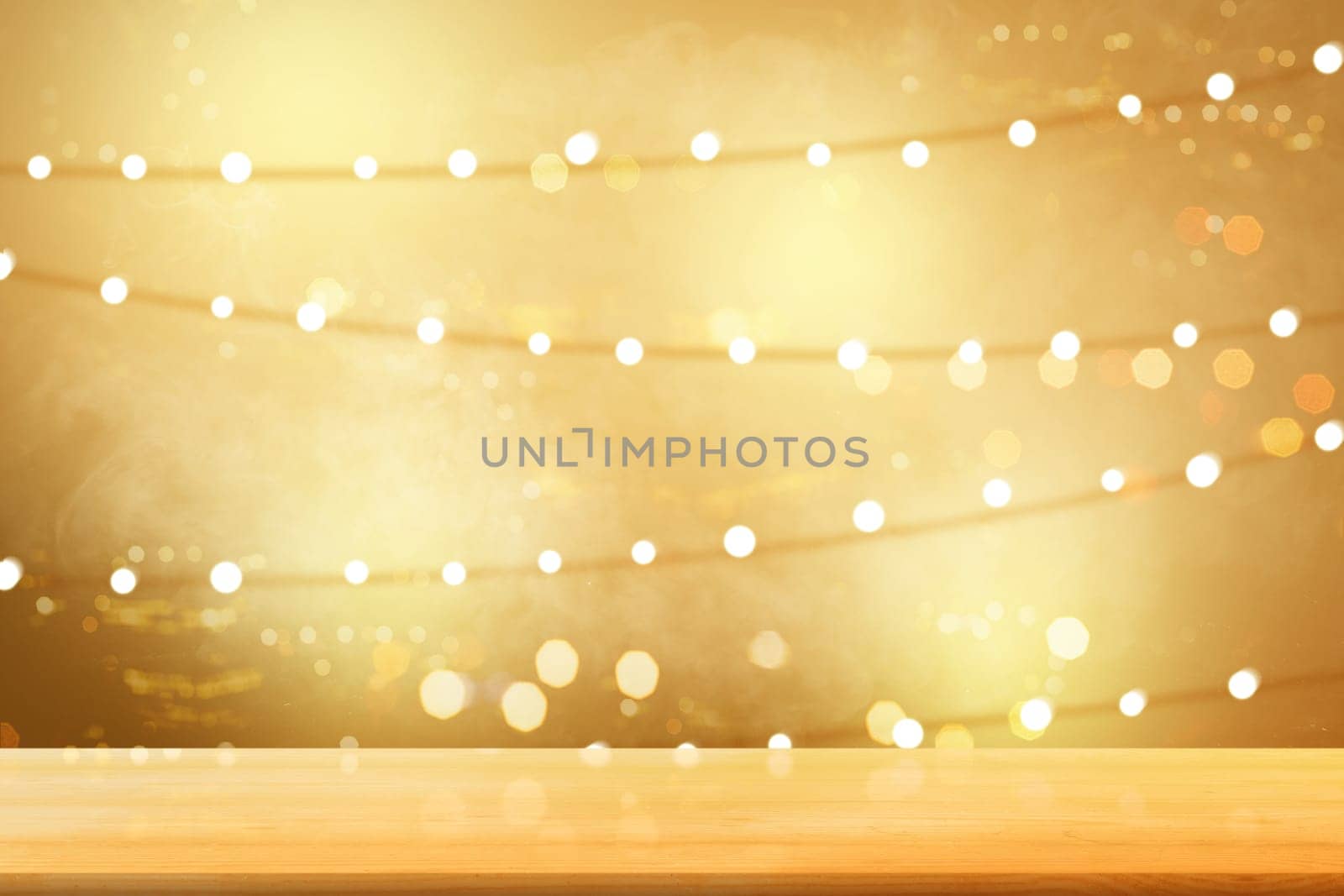 Wooden table with blurry lights over bright background