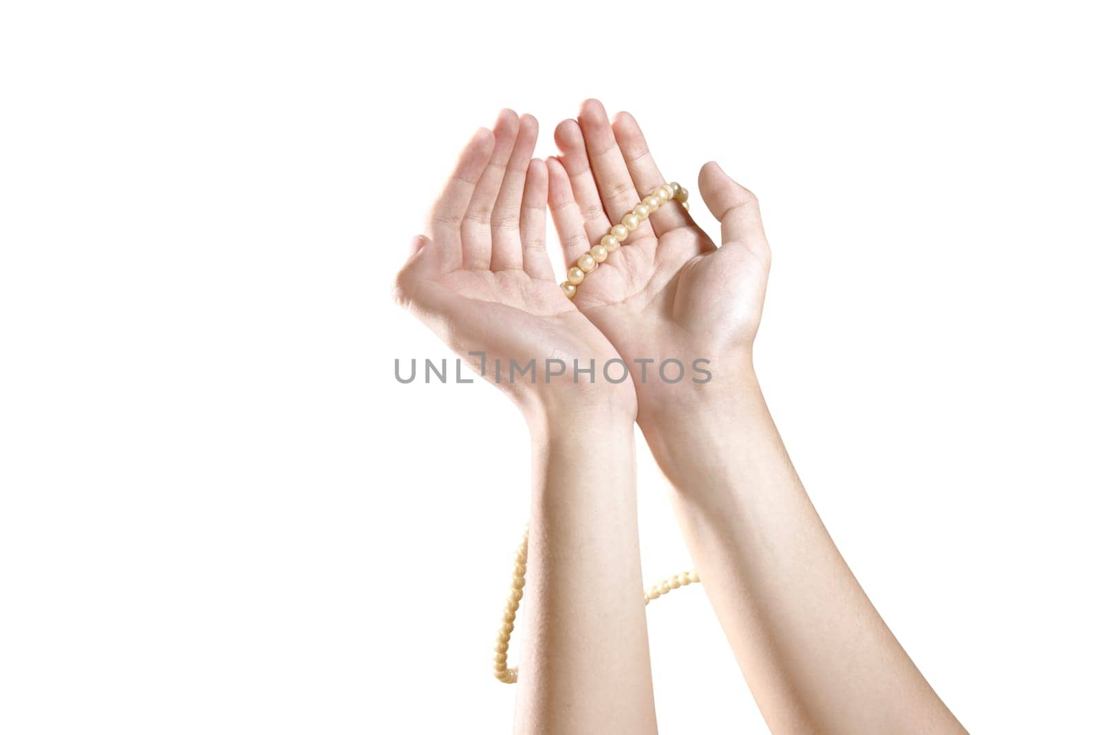 Muslim hands praying with prayer beads isolated over white background