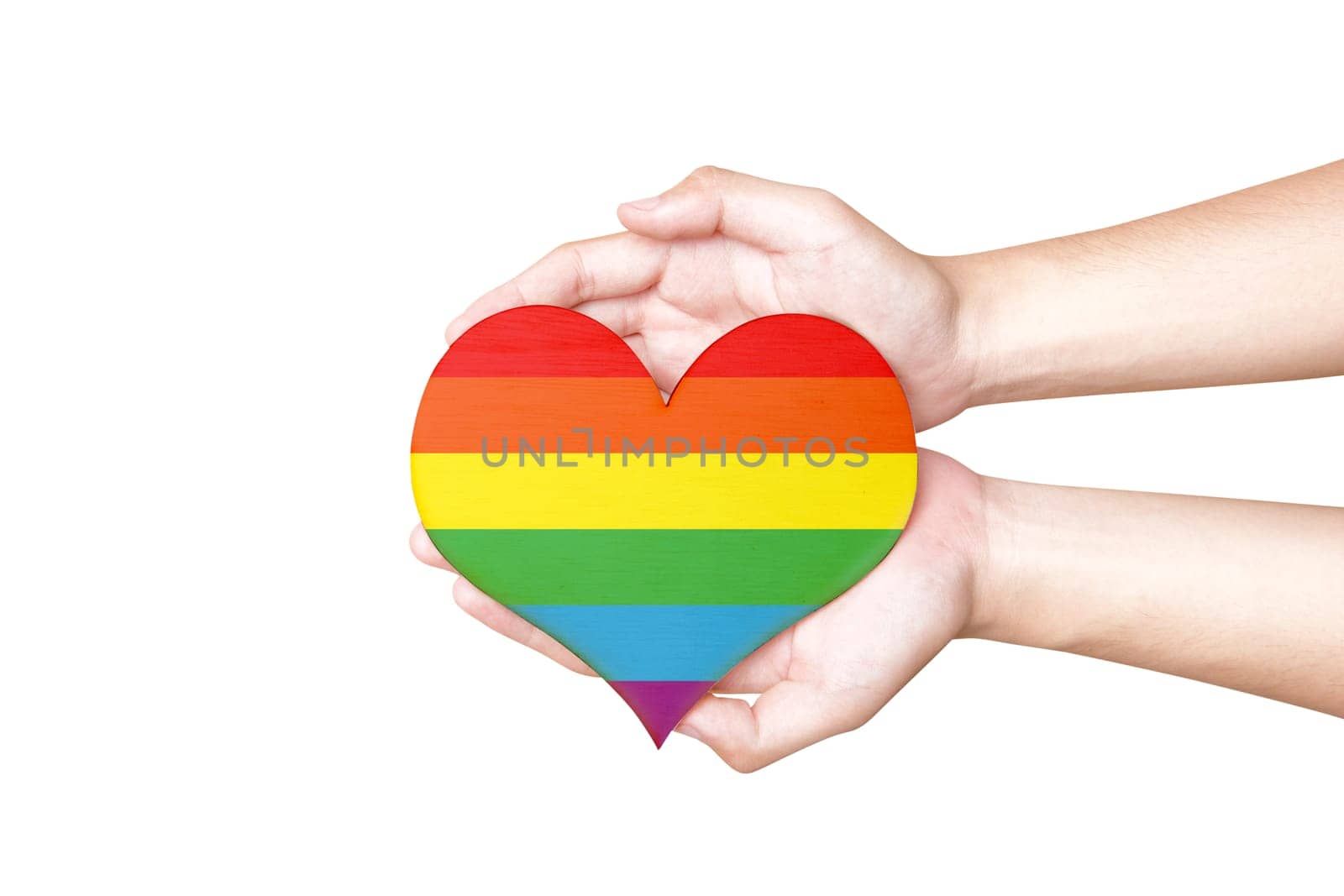 Human hands holding heart with rainbow flag as a symbol of LGBT isolated over white background