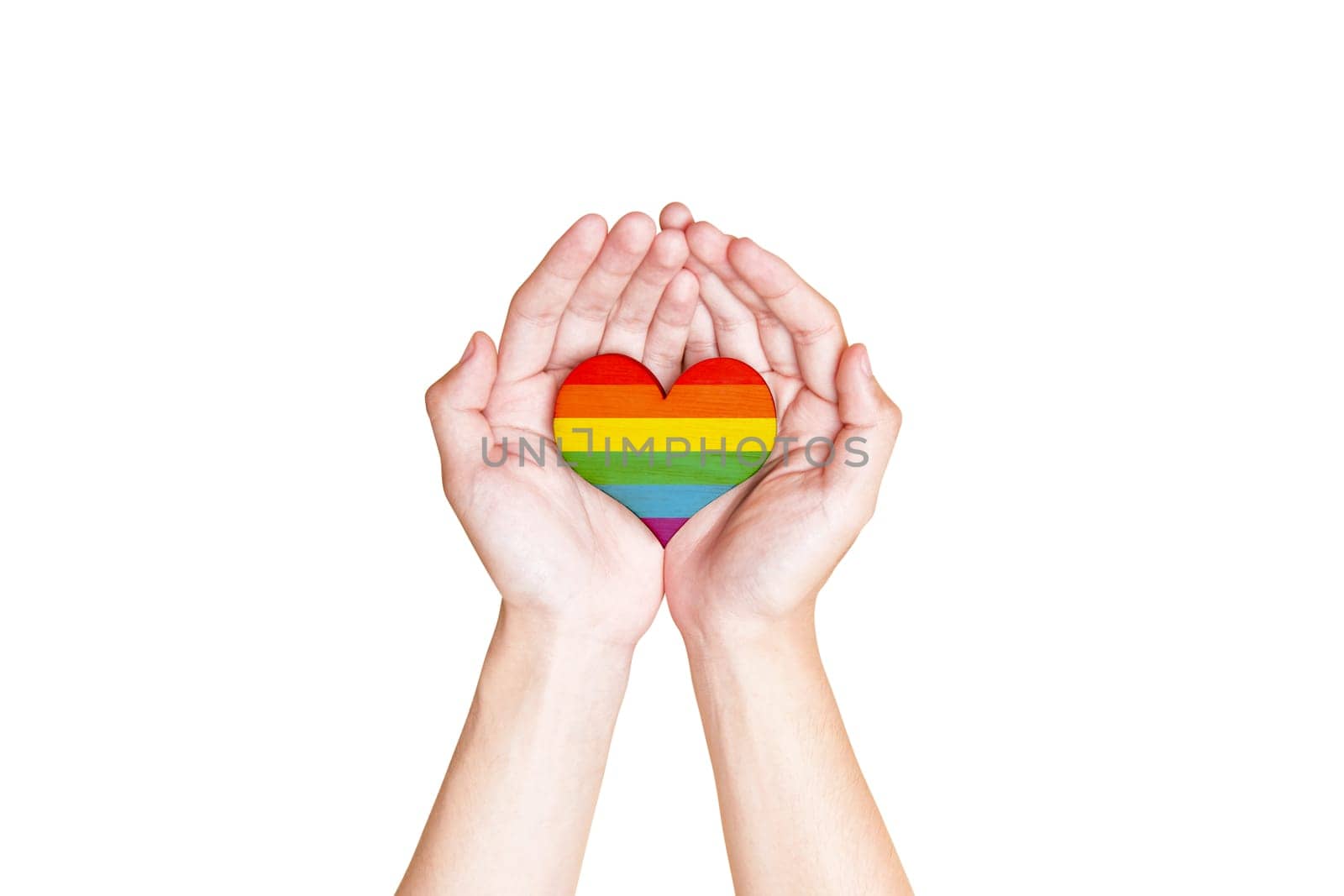 Human hands holding heart with rainbow flag as a symbol of LGBT isolated over white background