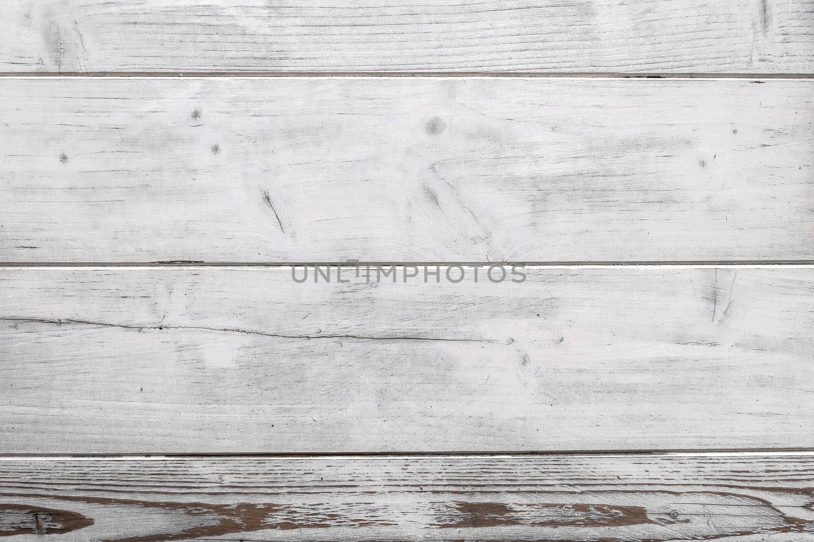 White vintage wood with planks. Retro style. It can be used as textures and backgrounds.