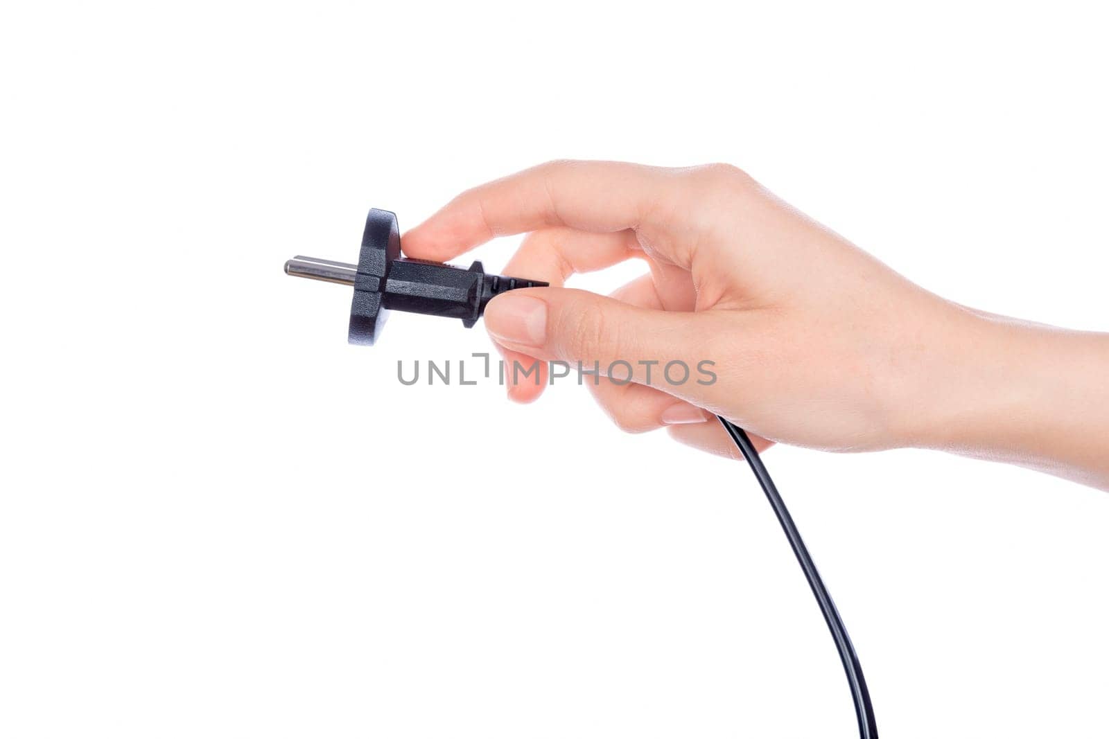 Woman hand holding black male wire plug isolated on white background