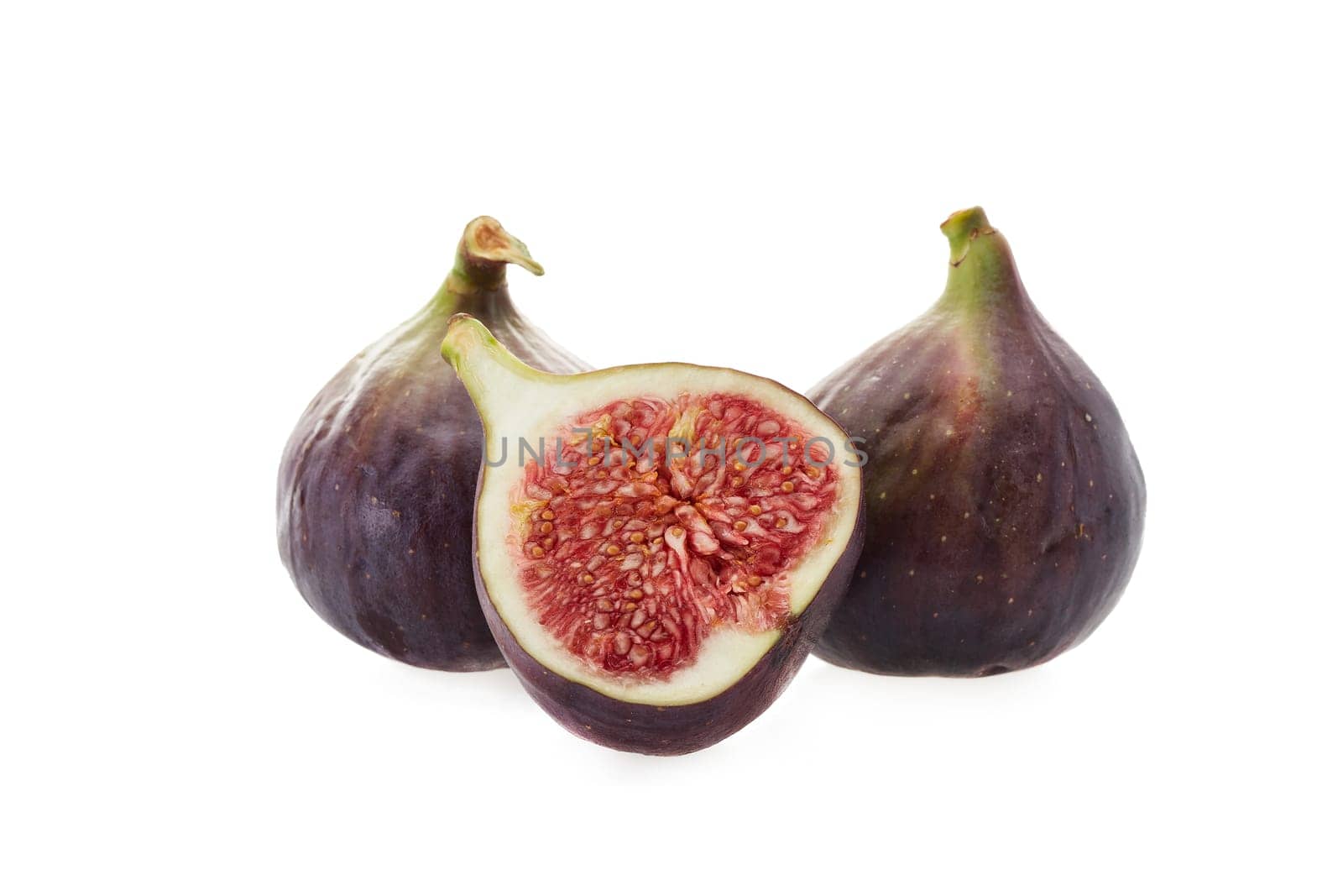 Fresh ripe sweet figs on a white background.