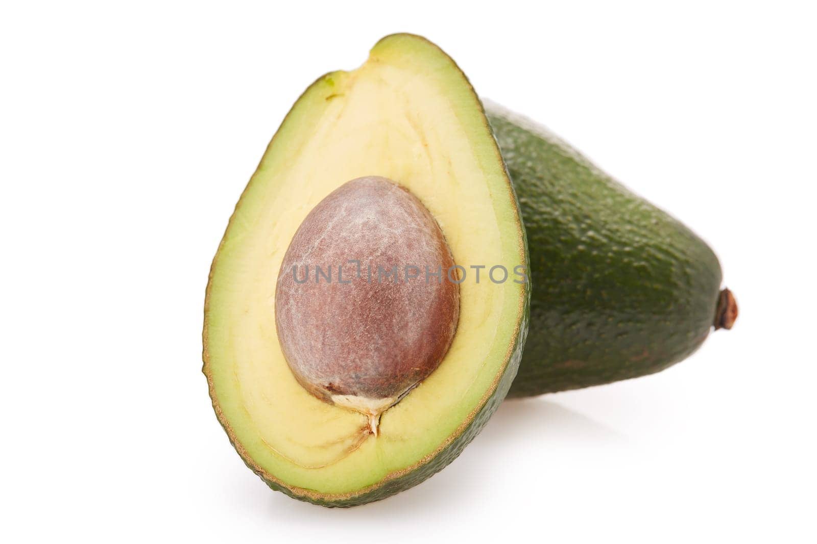 Fresh avocado fruits on a white background.