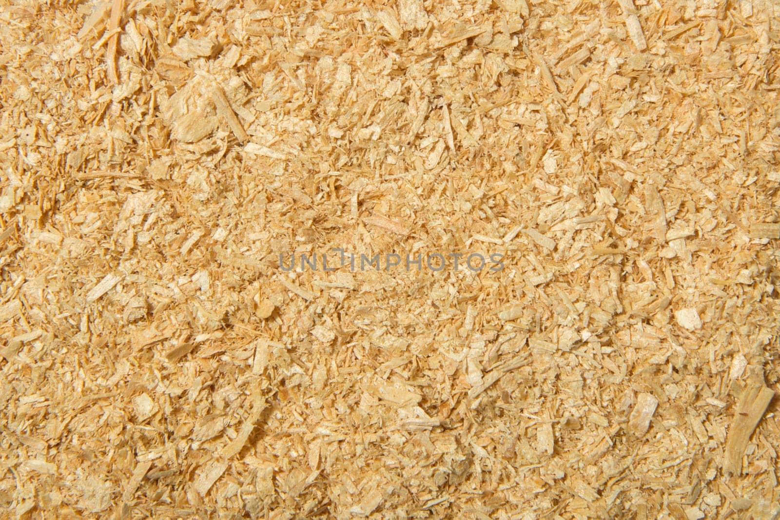 Background from a freshly cut brown sawdust