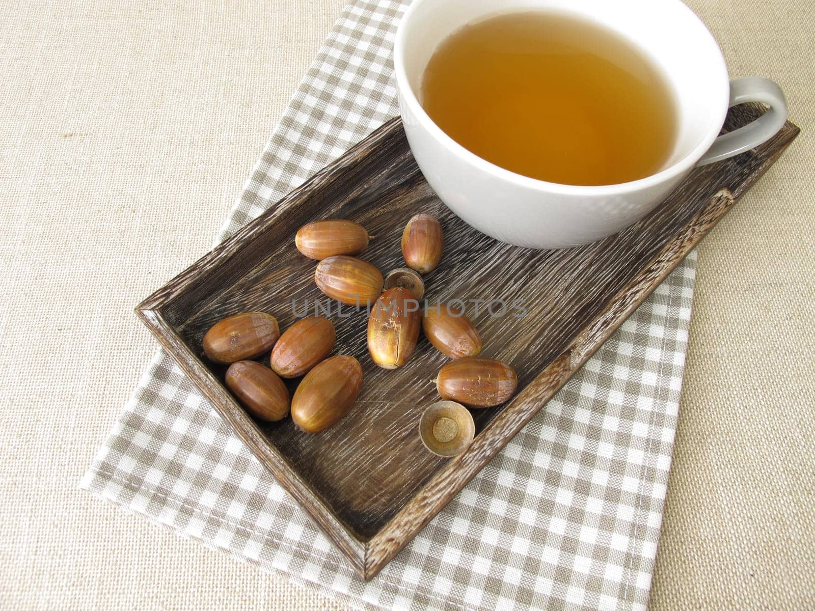 Acorn coffee from roasted acorns on a tray