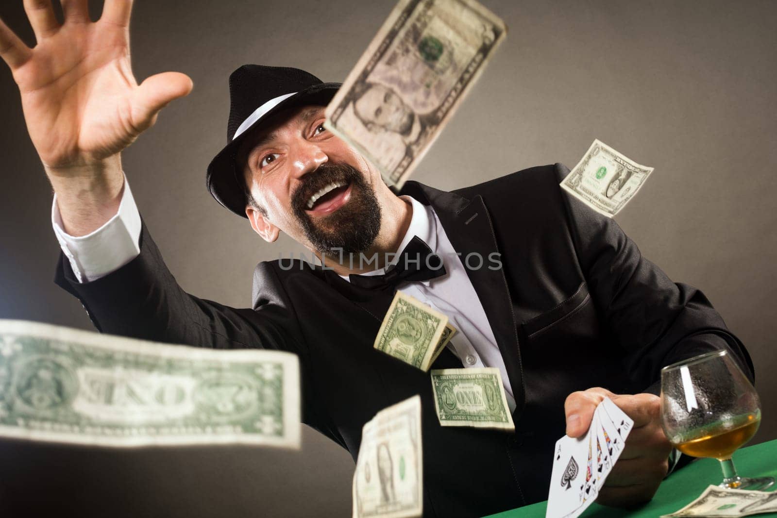 The lucky winner is getting jackpot for successful ending poker game with royal flash, gambling concept.