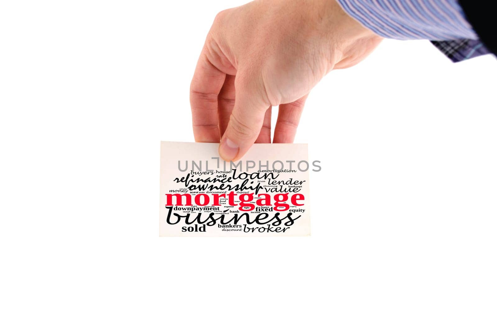 Mortgage word cloud collage over note in human hand
