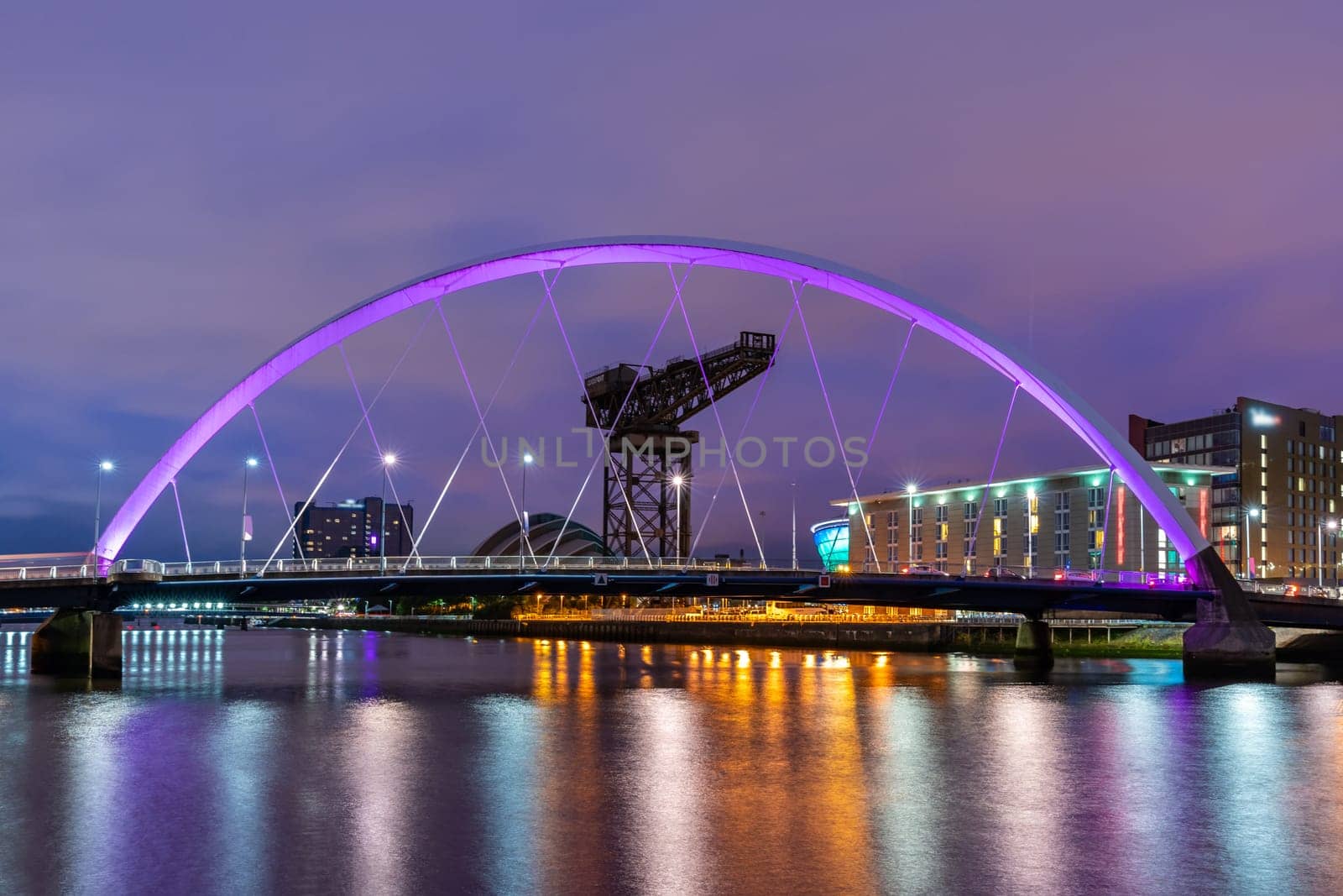 Clyde Arc Bridge along River Clyde Sunset twilight at Glasgow city Scotland UK.