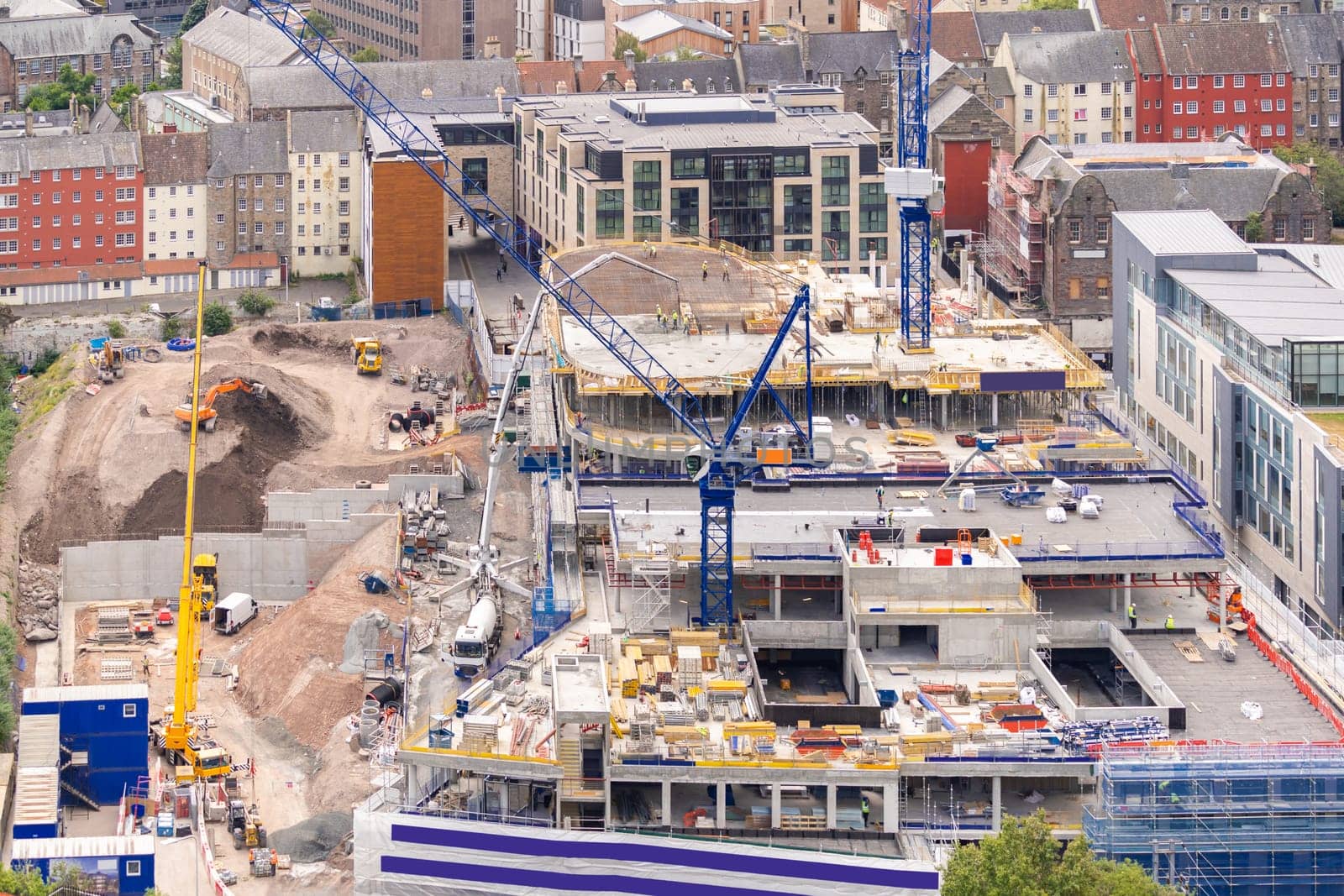 Construction crane working in construction site in Scotland UK
