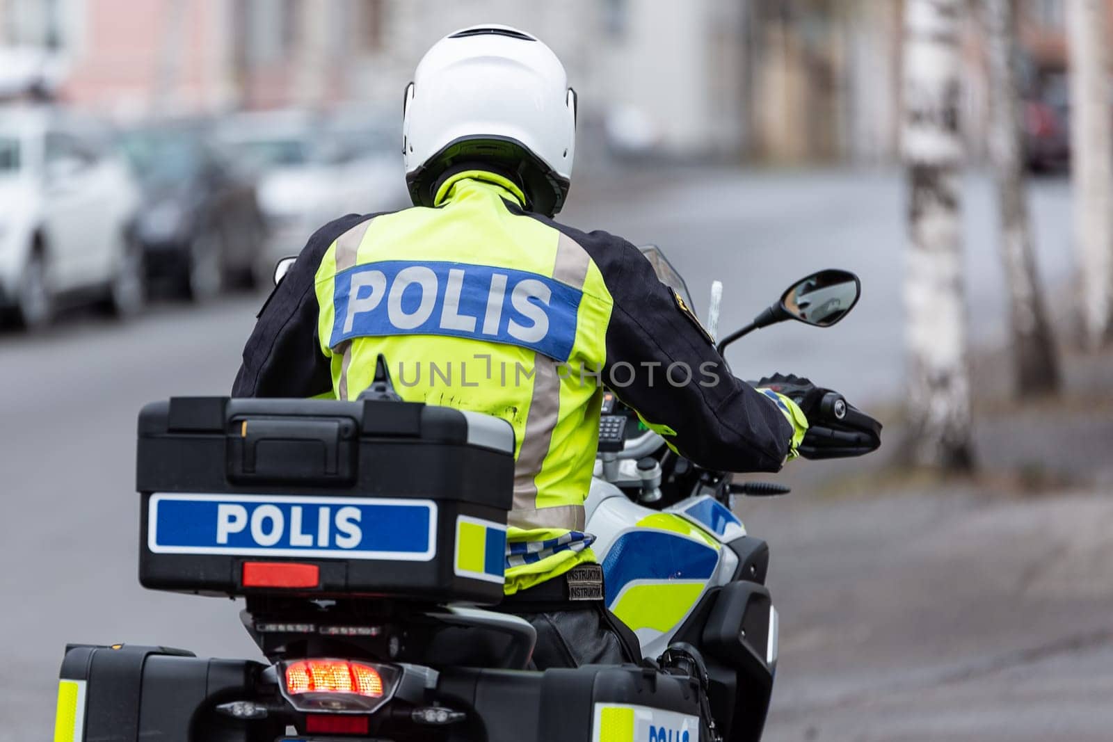 Swedish Motorcycle Police Officer from behind.