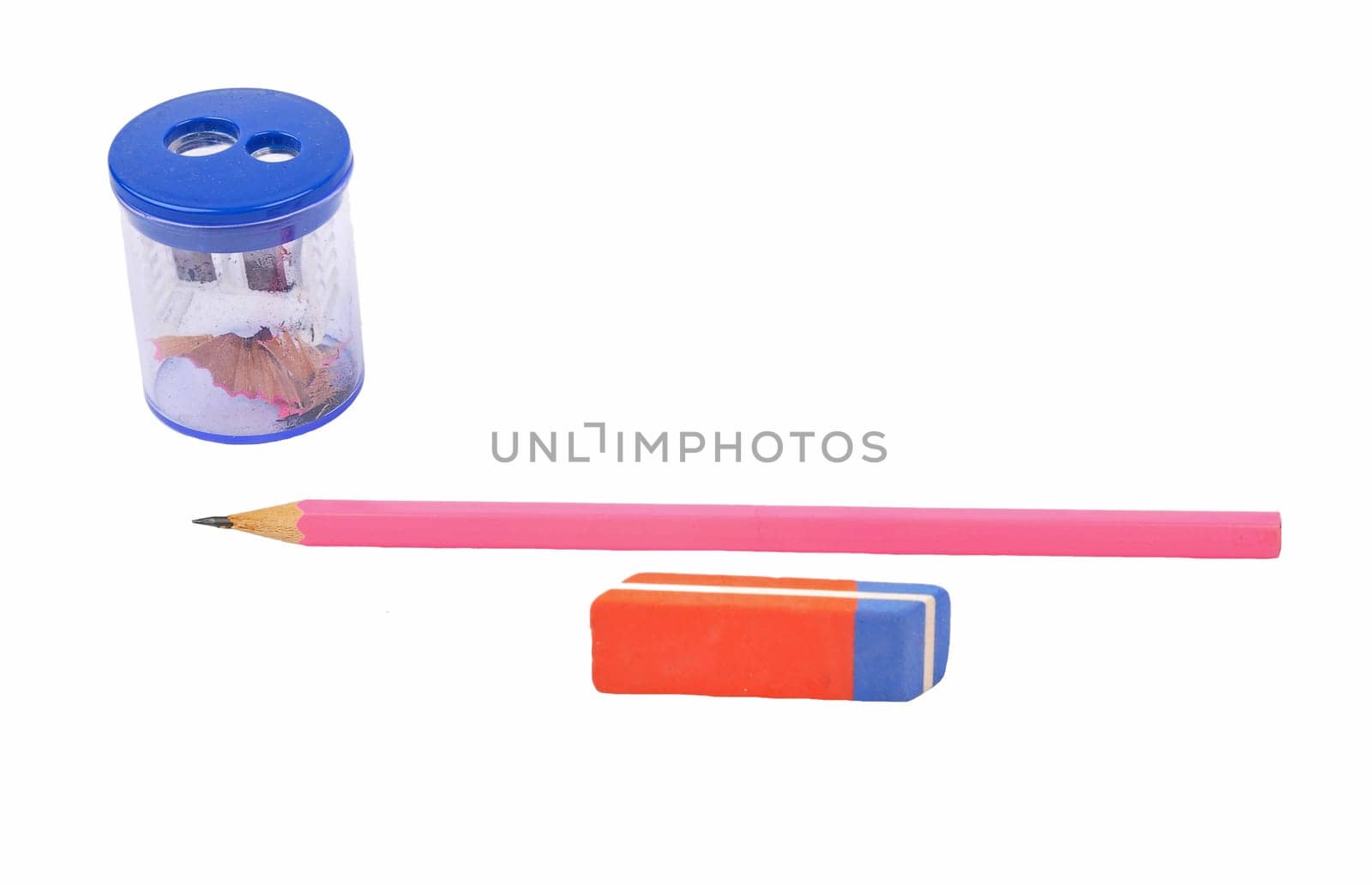 Pencil, eraser and sharpener on white