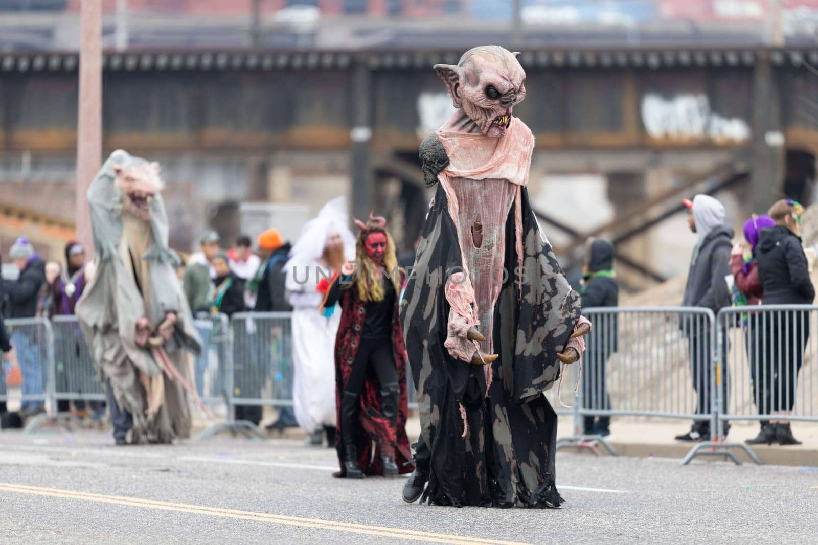 St. Louis, Missouri, USA - March 2, 2019: Bud Light Grand Parade, People wearing halloween outfits, walking down 7th street during the parade