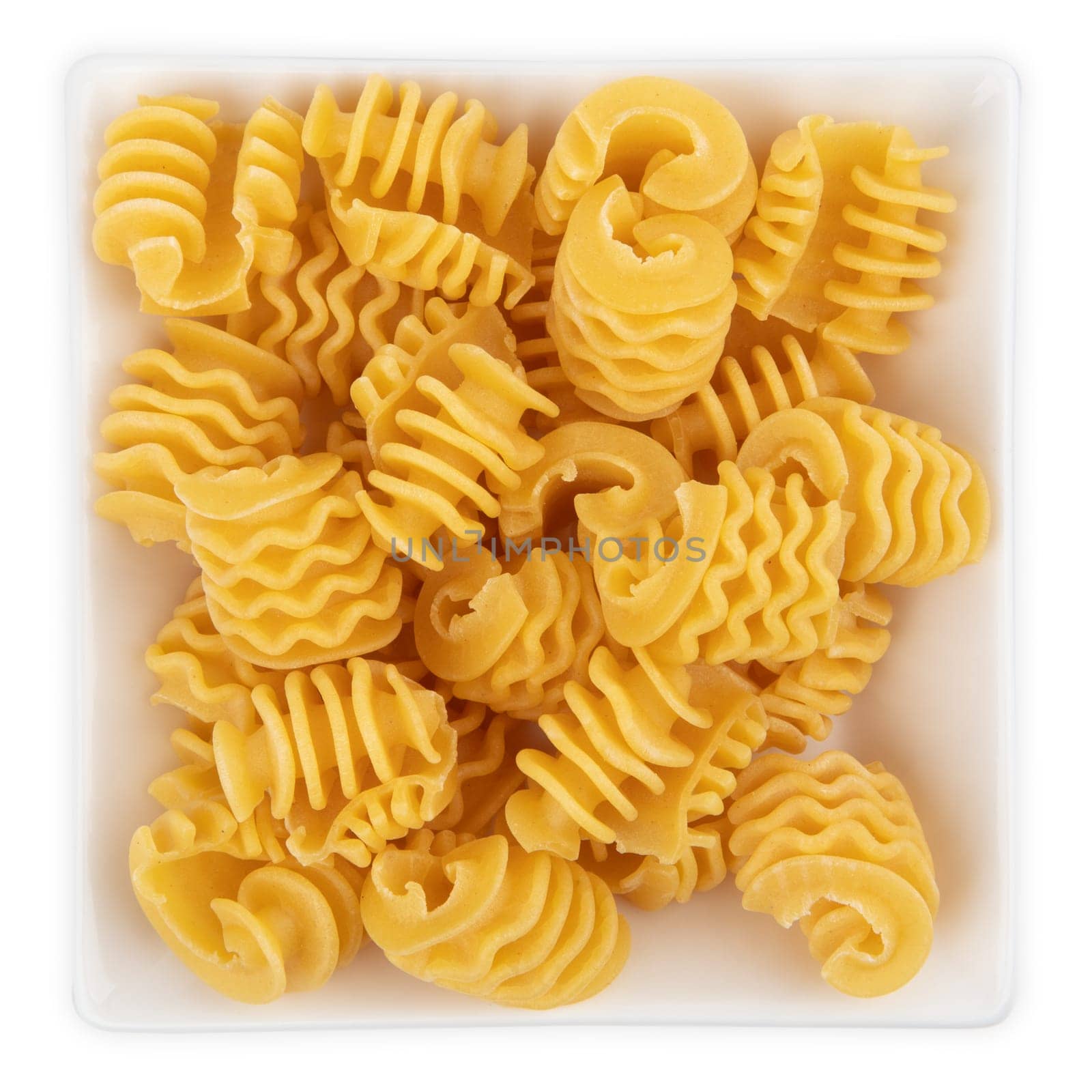 Raw Noodles in a bowl isolated on white background