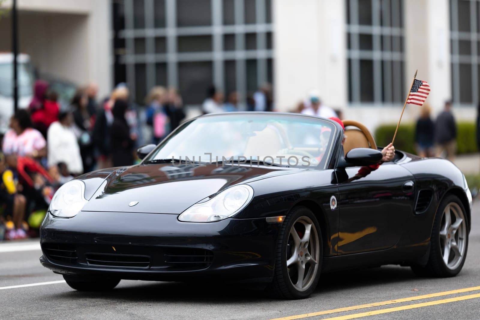 Wilmington, North Carolina, USA - April 6, 2019: The North Carolina.Azalea Festival, Porsche Sport car driving down the street at the parade