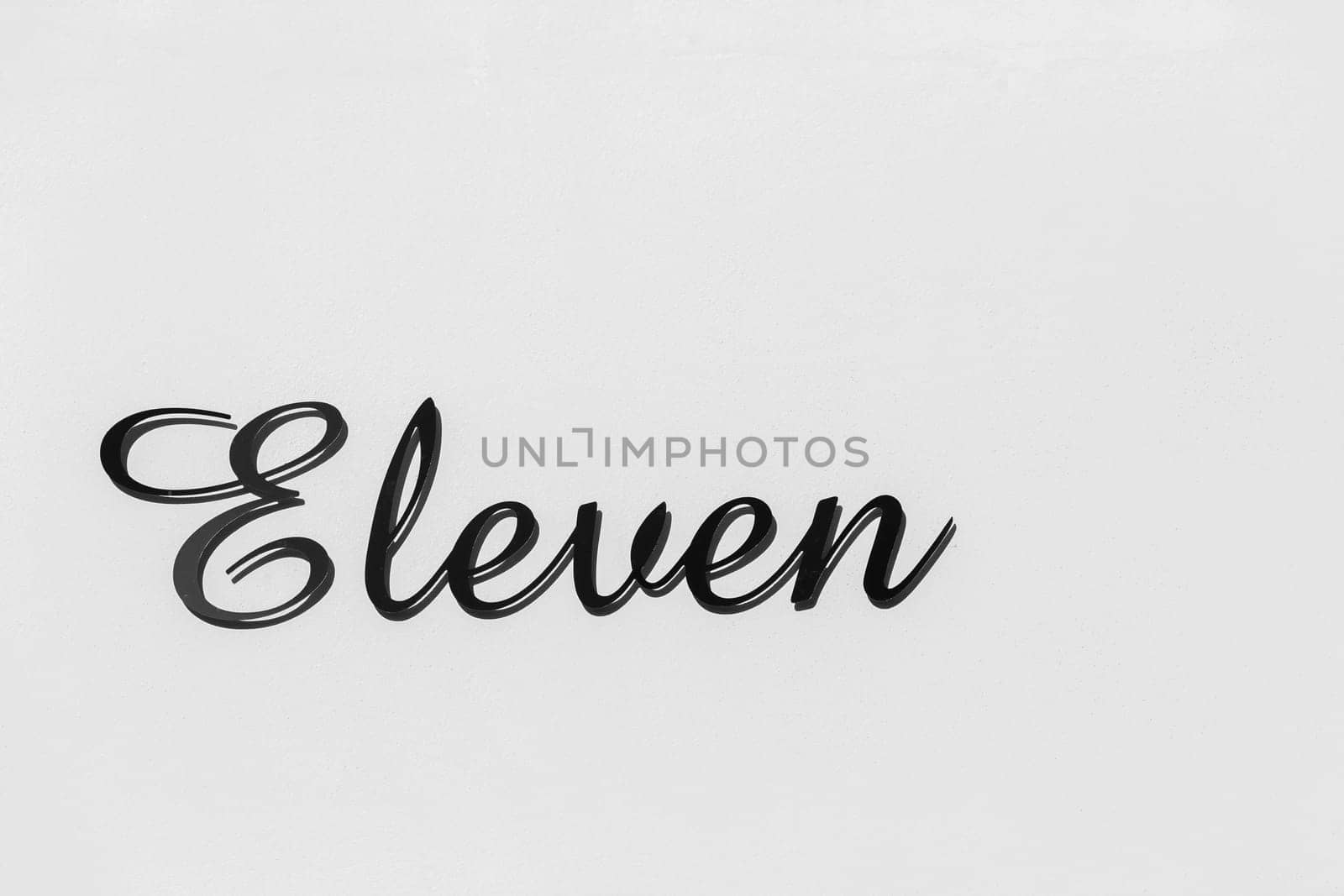 Number Eleven sign metal plate decor black and white.