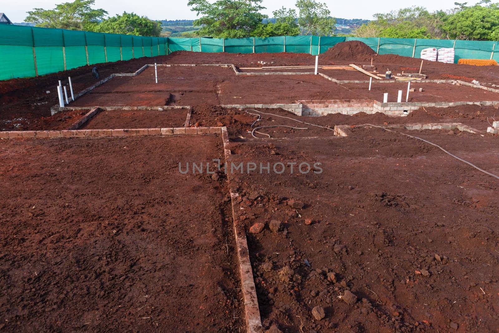Construction design of new house foundations layout earth works soil  for rooms and plumbing pipes