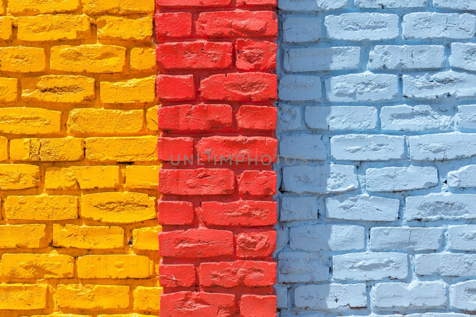 Brick wall painted blue outside decor texture detail color closeup background building structure..