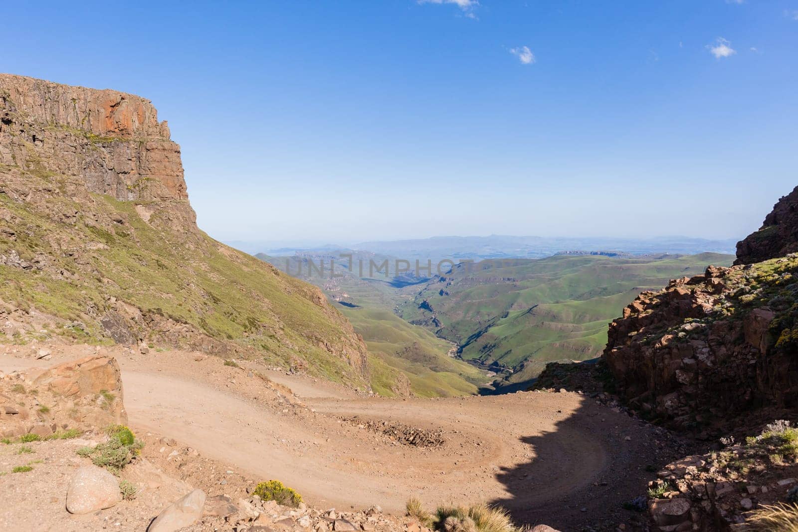 Mountain high dirt road pass from river valley up or down by four wheel vehicle  summer landscape
