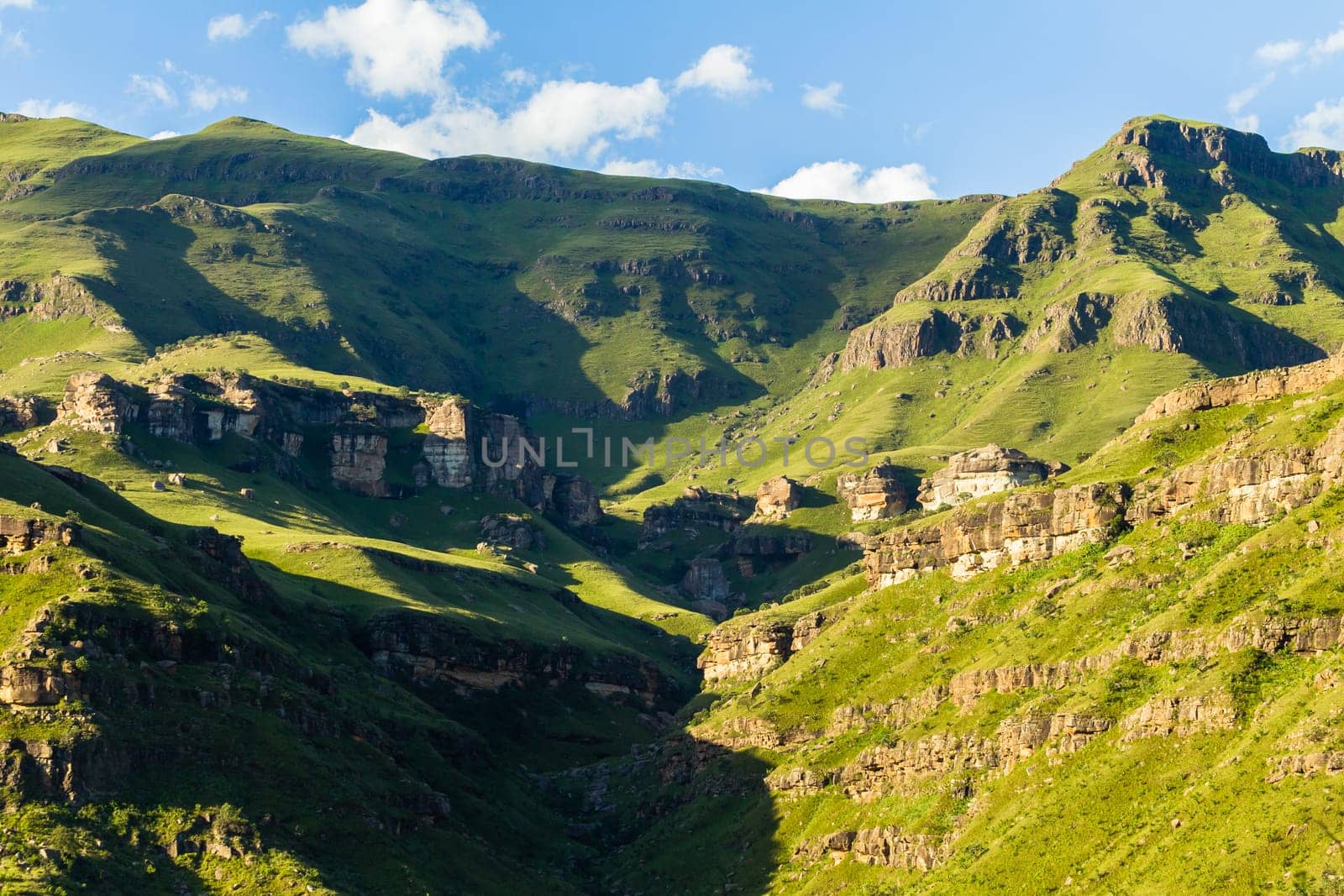 Mountains rock cliffs hills valley summer scenic rural landscape.