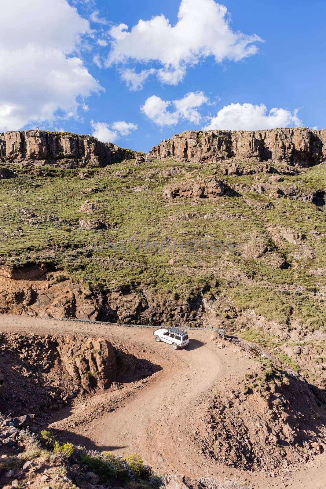 Mountain high dirt road pass from river valley up or down by four wheel vehicle  summer landscape