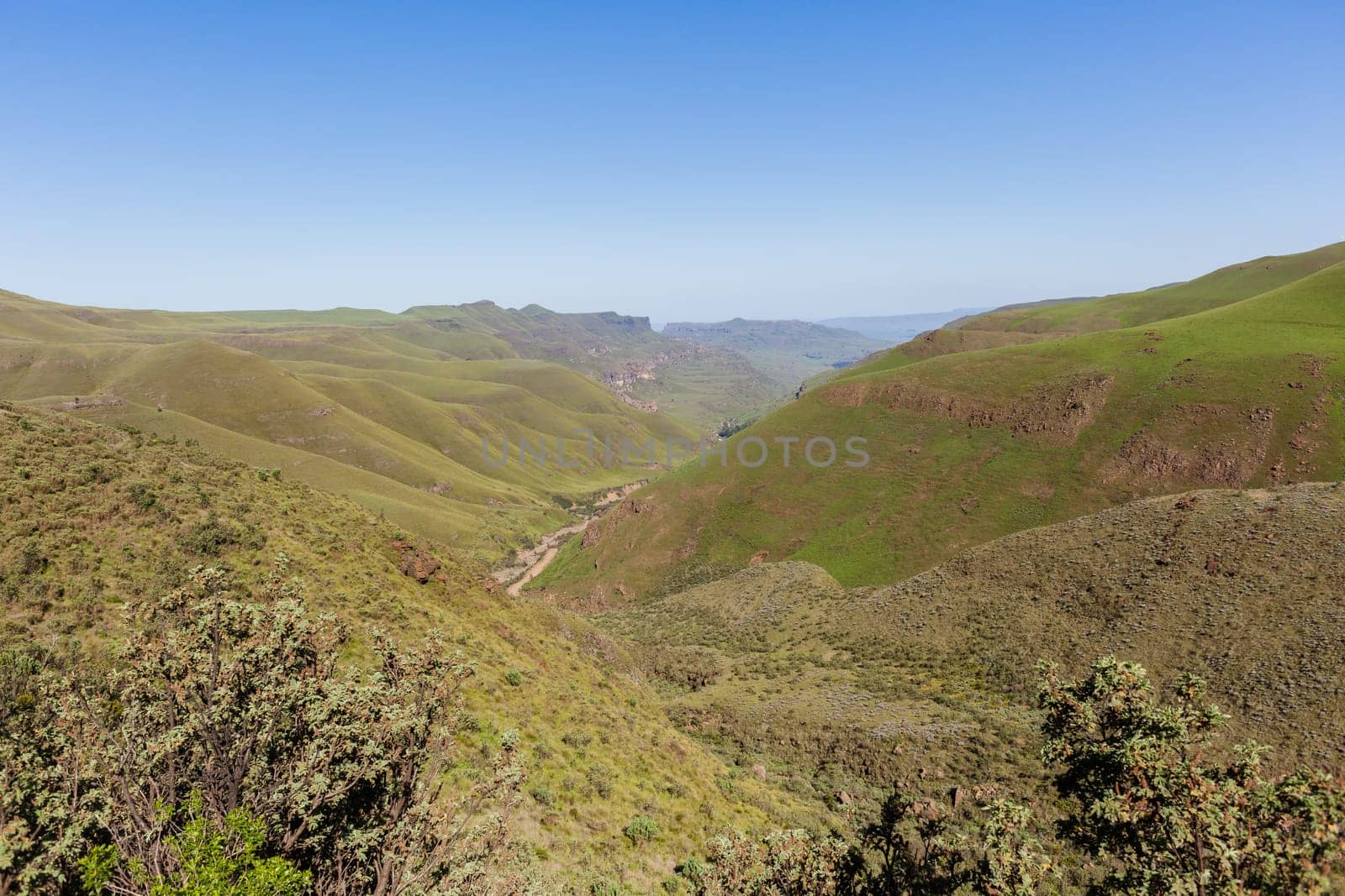 Mountain high dirt road pass from river valley up or down by four wheel vehicle  summer landscape