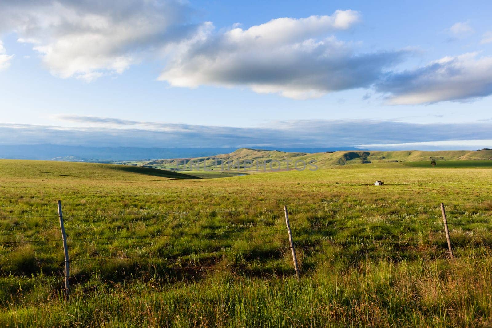 Mountains farmlands scenic valley plateau landscape late summer afternoon landscape..