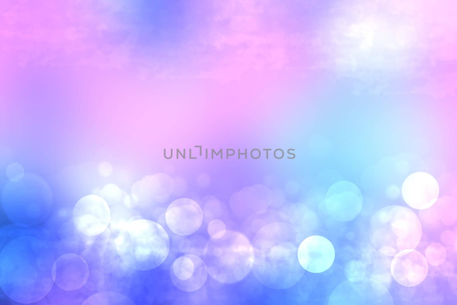 Abstract gradient of light blue pink pastel background texture with glowing circular bokeh lights. Beautiful colorful spring or summer backdrop.