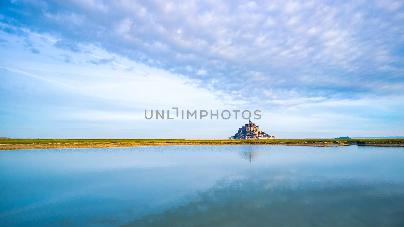 Mont-Saint-Michel and the bay at dawn in Normandy, France