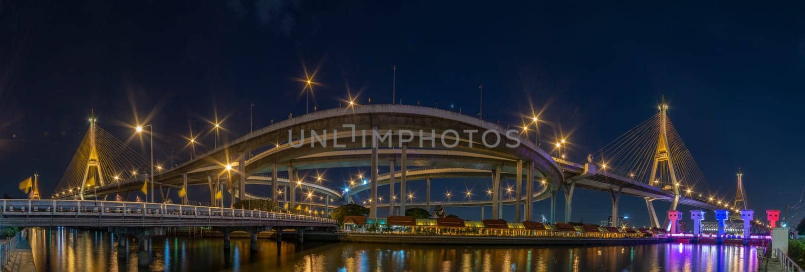 Bhumibol Bridge, Chao Phraya River Bridge. Turn on the lights in many colors at night.