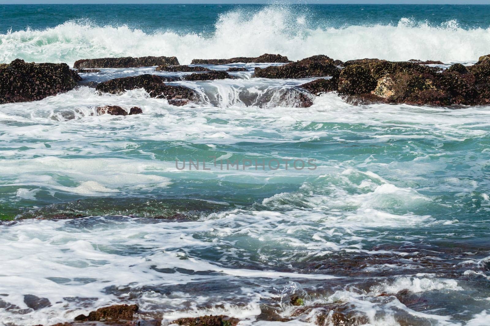 Beach Rocky ocean coastline tidal water pools closeup nature landscape..
