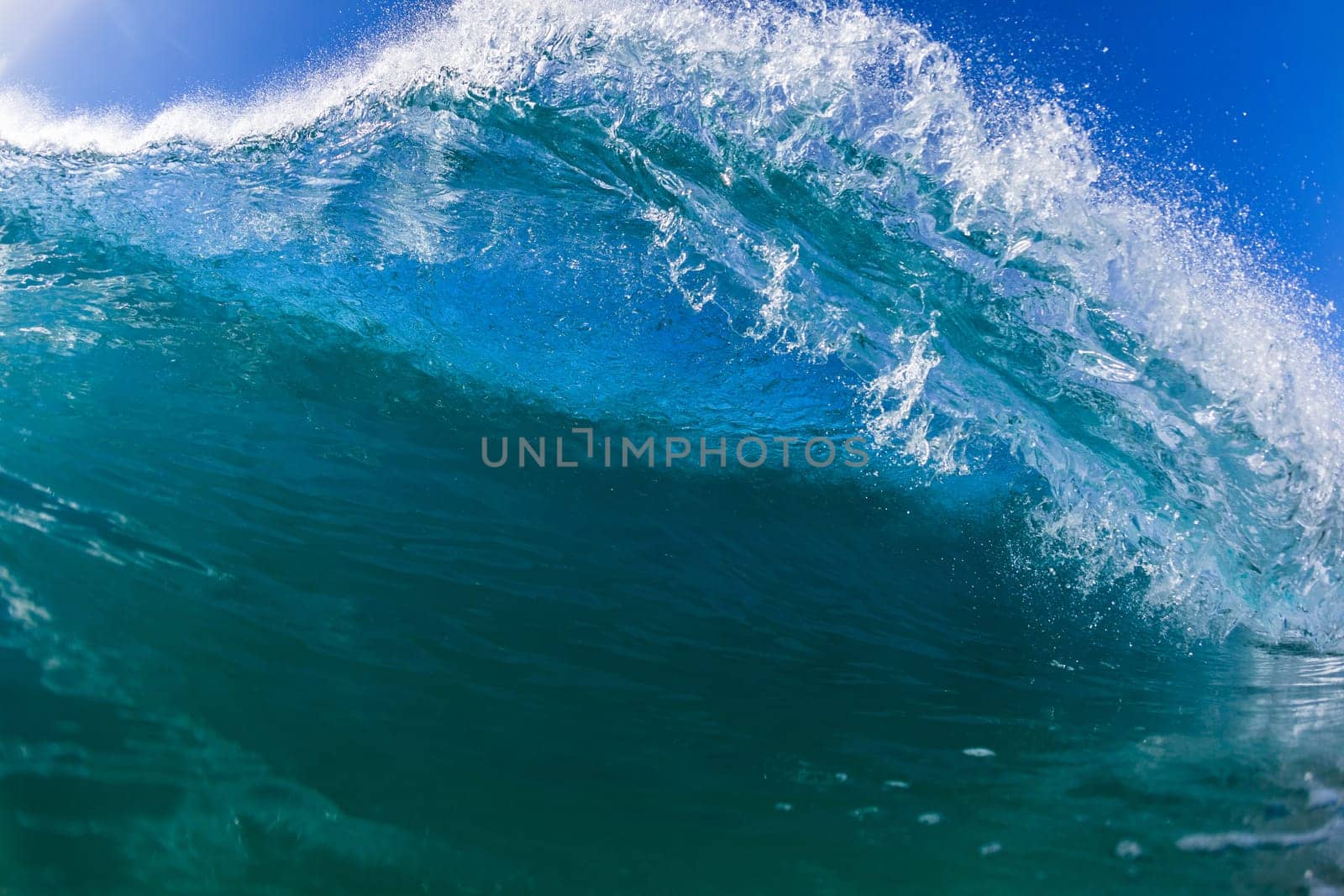 Wave inside out hollow crashing blue water swimming water photo