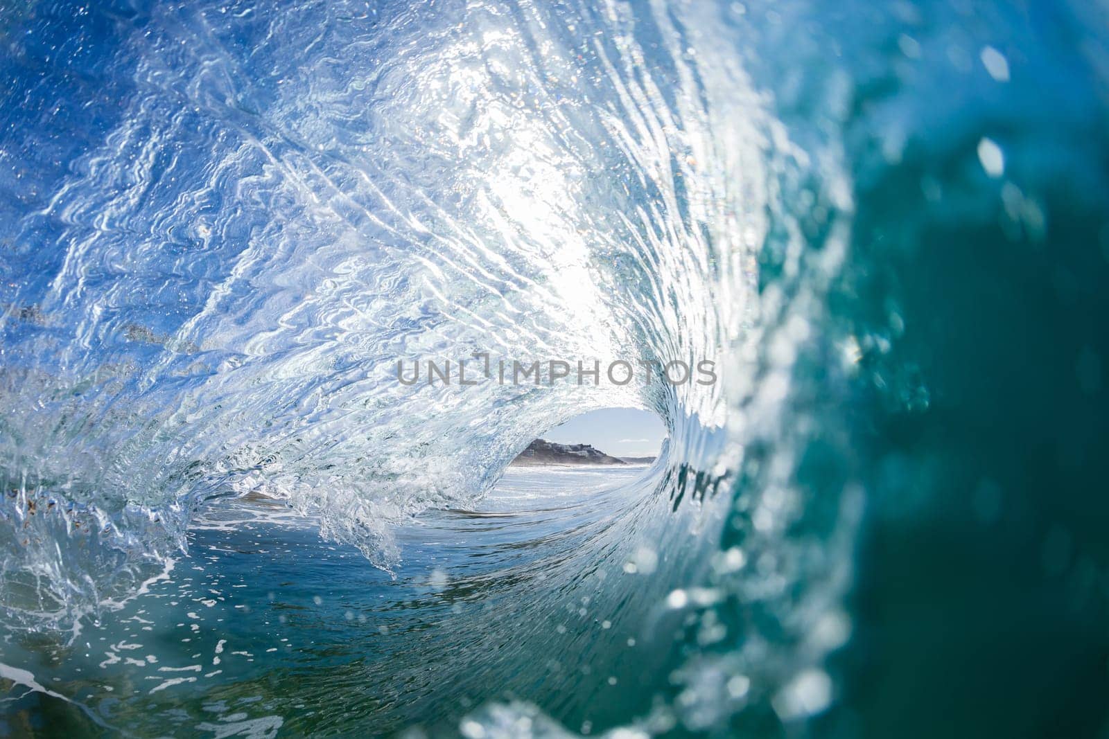 Wave inside out hollow crashing blue water swimming water photo
