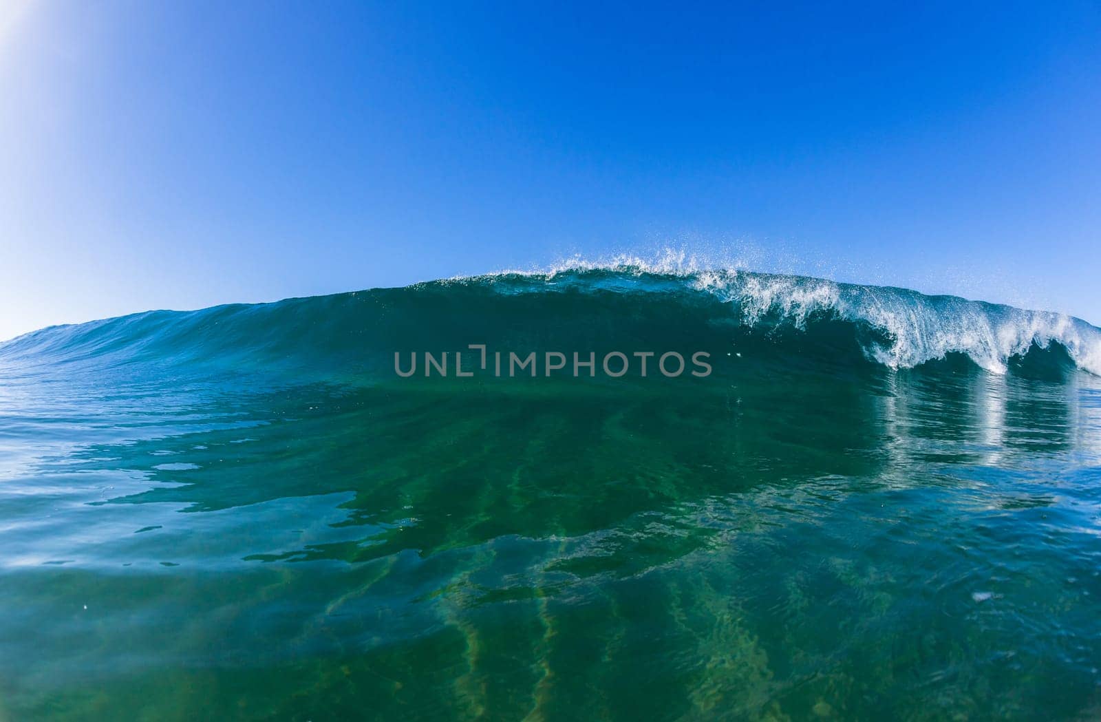 Wave inside out hollow crashing blue water swimming water photo
