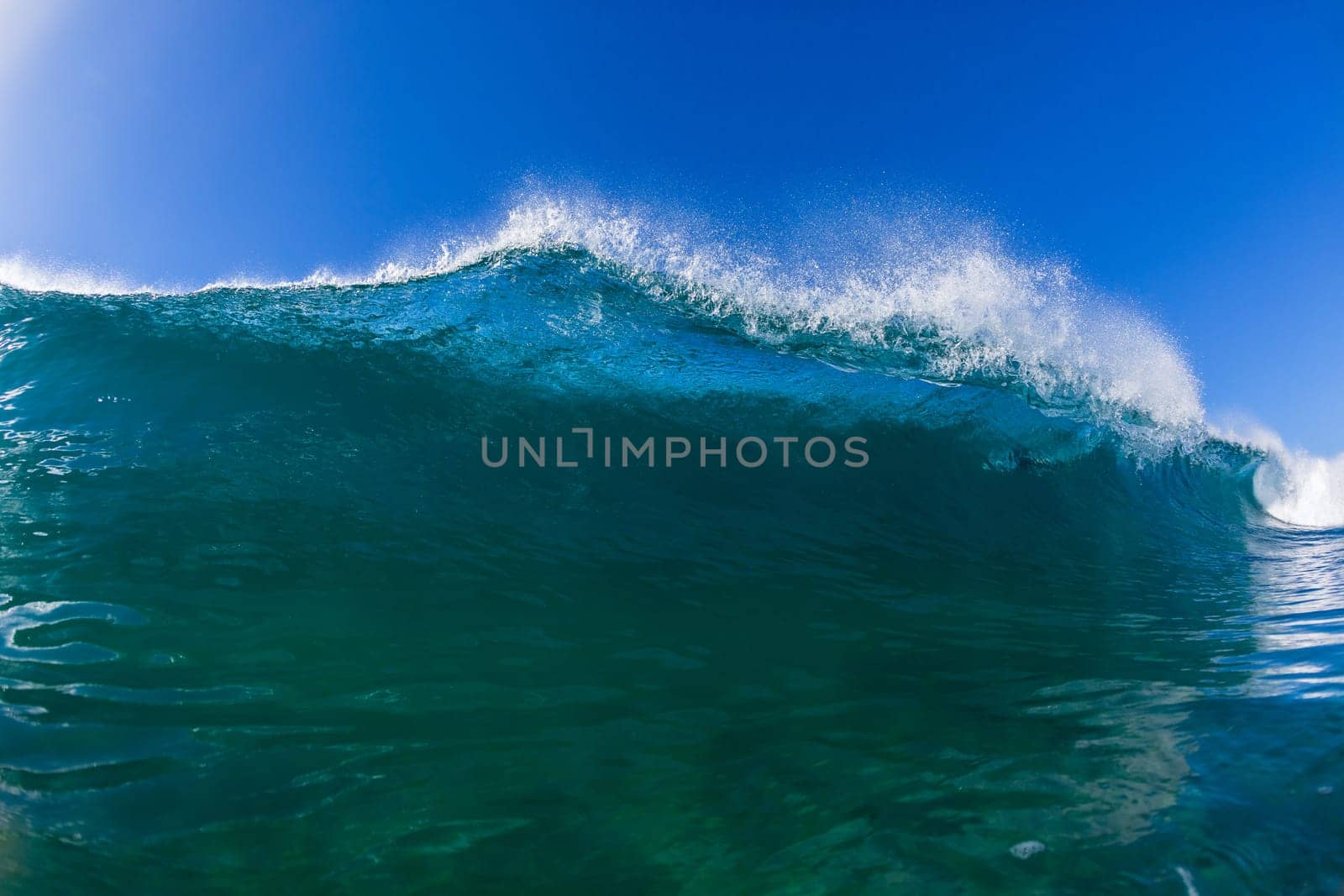 Wave inside out hollow crashing blue water swimming water photo