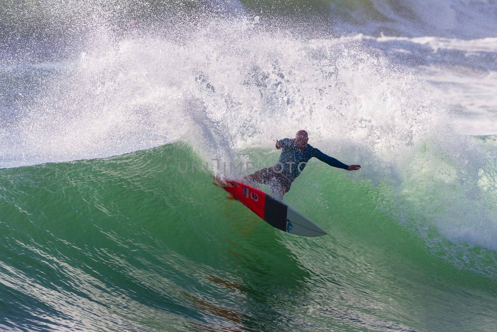Surfing surfer closeup wave action water photo.