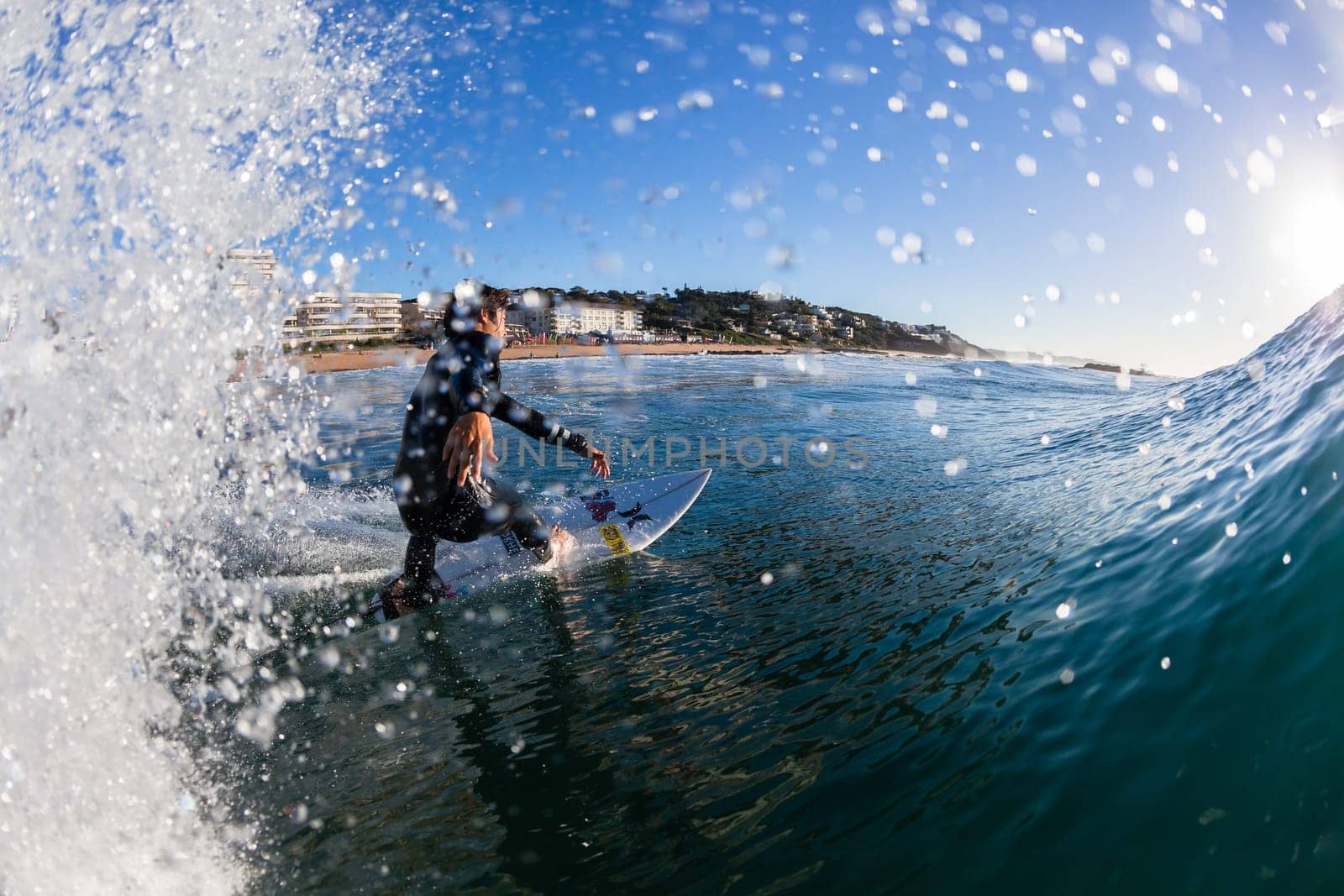 Surfing surfer closeup wave action water photo.