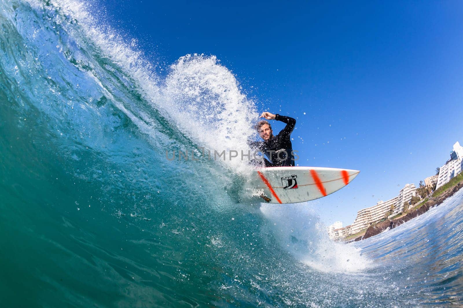 Surfing surfer closeup wave action water photo.
