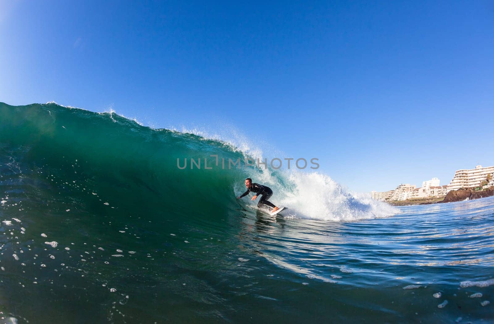 Surfing surfer closeup wave action water photo.