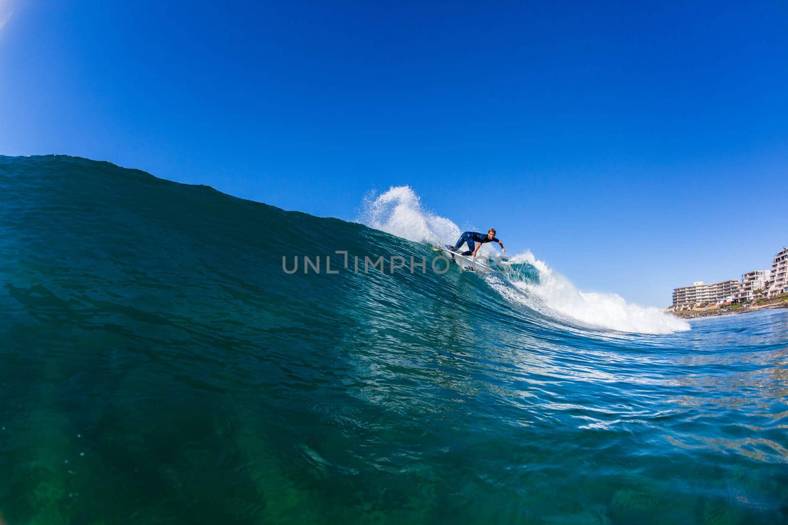 Surfing surfer closeup wave action water photo.