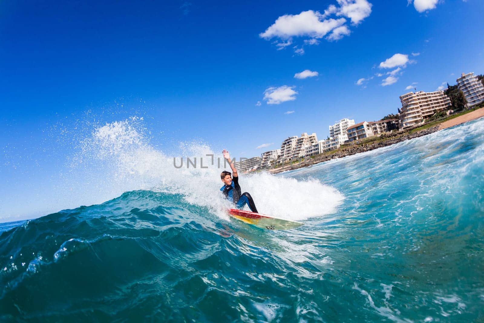 Surfing surfer closeup wave action water photo.