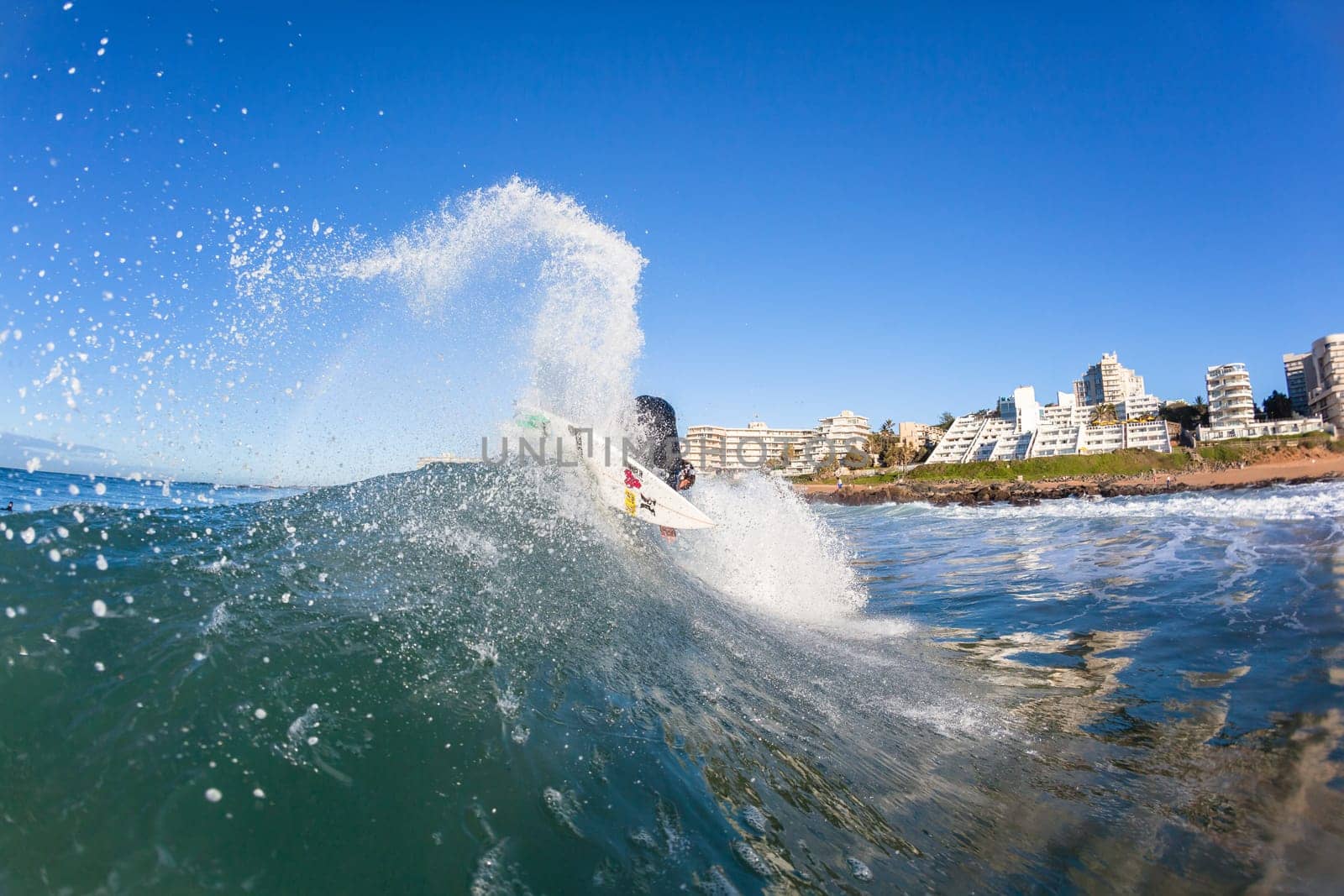 Surfing surfer closeup wave action water photo.
