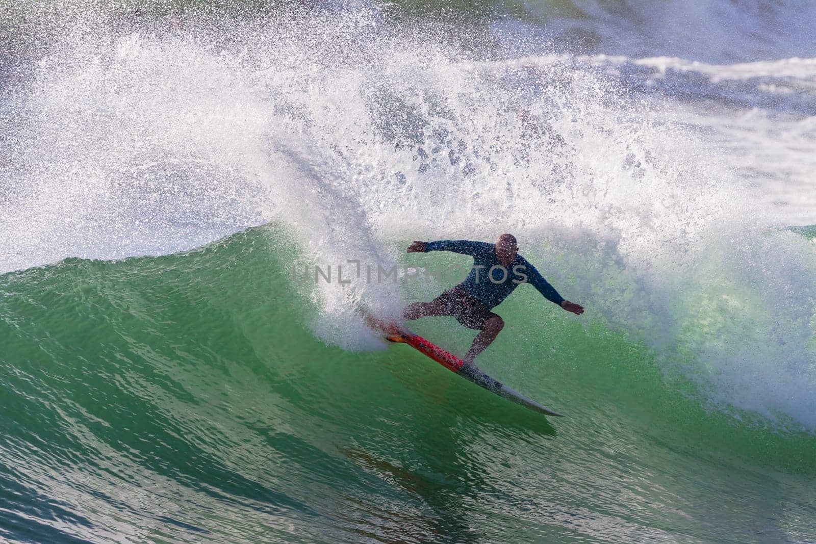 Surfing surfer closeup wave action water photo.