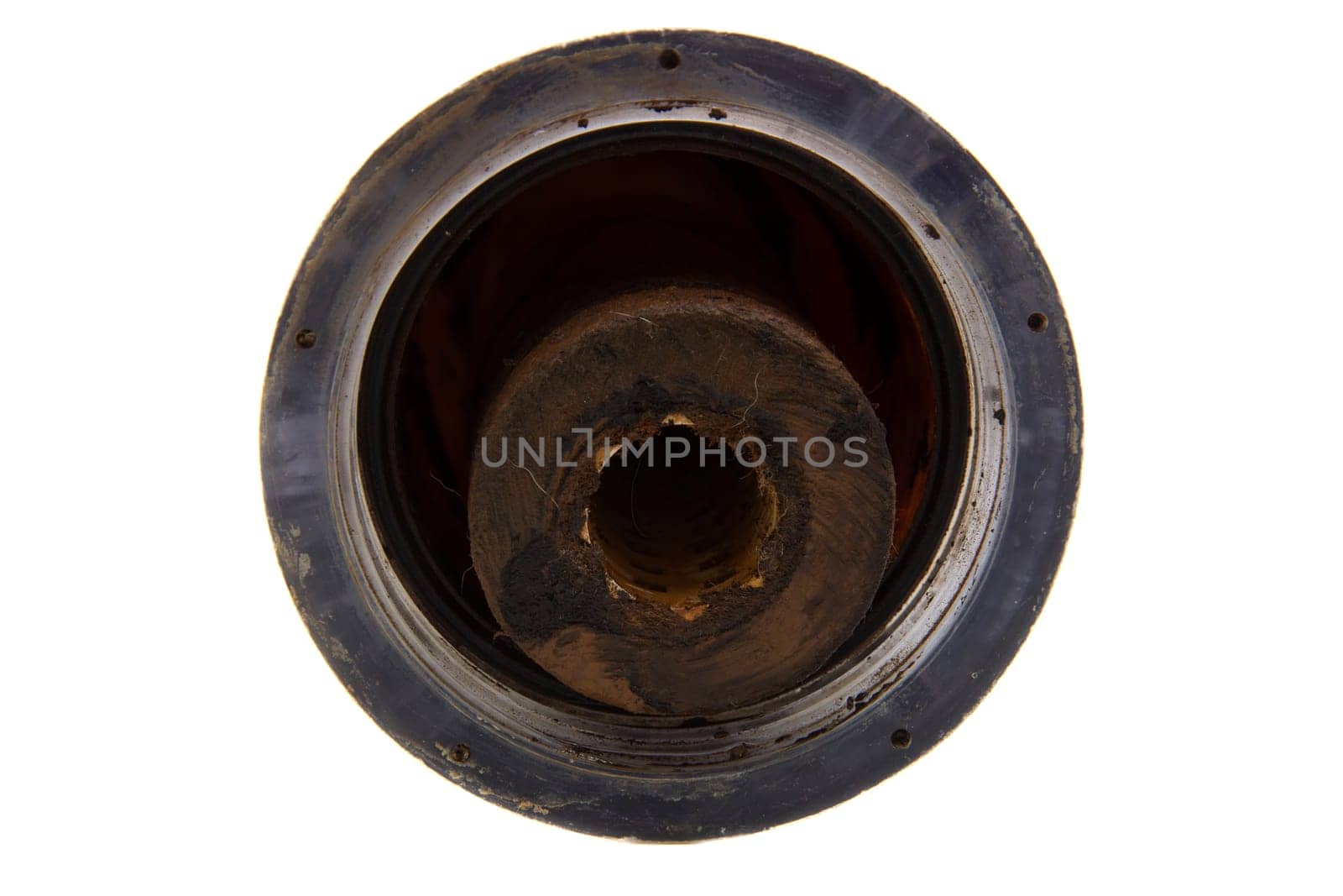Old dirty water filter in plastic holder isolated on white background