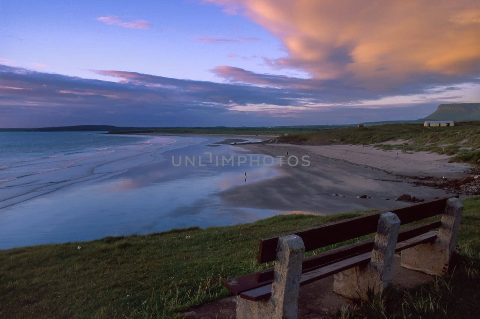 People on the beach and in the sea at Rosses Point with Ben Bulben in the background, County Sligo, Ireland